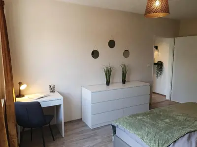 Ein Bett oder Betten in einem Zimmer der Unterkunft ☆ Like @ home *☆ moderne Wohnung in Oberottmarshausen ☆ Netflix