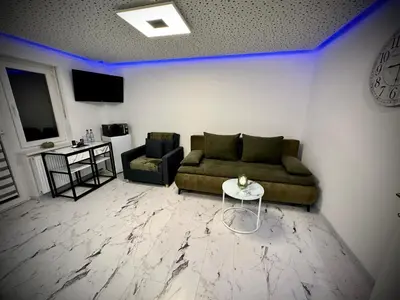 Ein Sitzbereich in der Unterkunft DeLuxe - Apartment ' Andrei 2 ' - Neu in Neuburg an der Donau