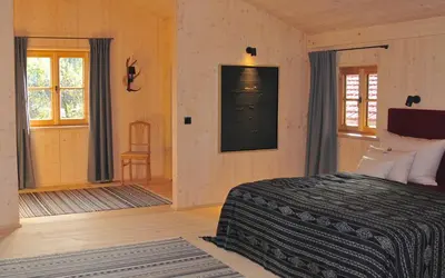 Ein Bett oder Betten in einem Zimmer der Unterkunft Lohei - Chalets im Chiemgau