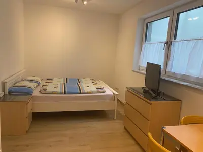 Ein Bett oder Betten in einem Zimmer der Unterkunft Apartment S&A