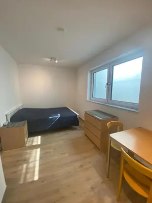 Ein Bett oder Betten in einem Zimmer der Unterkunft Apartment S&A