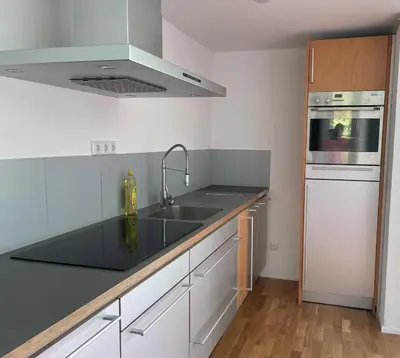 Küche/Küchenzeile in der Unterkunft Bungalow in ruhiger Siedlung mit Terrasse und Stellplatz