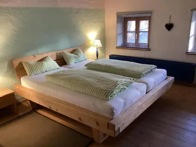 Ein Bett oder Betten in einem Zimmer der Unterkunft Der Birkenhof-Ried