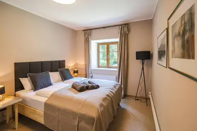 Ein Bett oder Betten in einem Zimmer der Unterkunft Mountain Chalet on Gut Buchwies