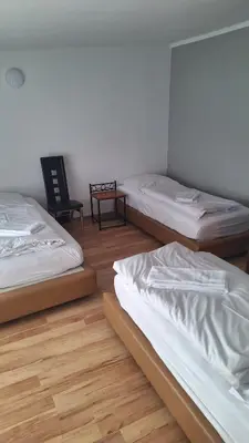 Ein Bett oder Betten in einem Zimmer der Unterkunft Pension Alis Augsburg