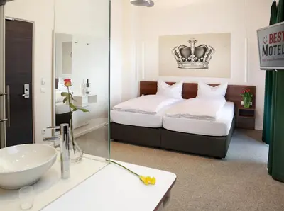 Ein Bett oder Betten in einem Zimmer der Unterkunft Best Motel