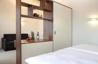 Ein Bett oder Betten in einem Zimmer der Unterkunft Best Motel