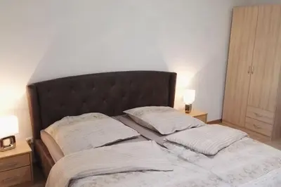 Ein Bett oder Betten in einem Zimmer der Unterkunft Fasanenpark