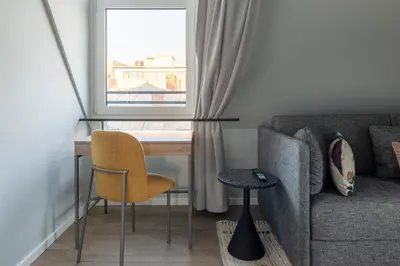 Ein Sitzbereich in der Unterkunft Numa Munich Blend