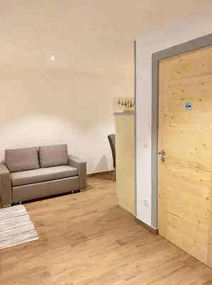 Ein Sitzbereich in der Unterkunft Zimmervermietung Huber