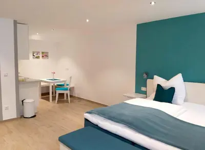 Ein Bett oder Betten in einem Zimmer der Unterkunft Zimmervermietung Huber