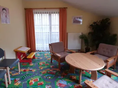 Ein Sitzbereich in der Unterkunft Ferienwohnung in Bayrischzell