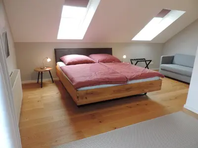Ein Bett oder Betten in einem Zimmer der Unterkunft Ferienwohnung-Geltendorf Nähe Ammersee