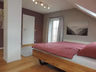 Ein Bett oder Betten in einem Zimmer der Unterkunft Ferienwohnung-Geltendorf Nähe Ammersee