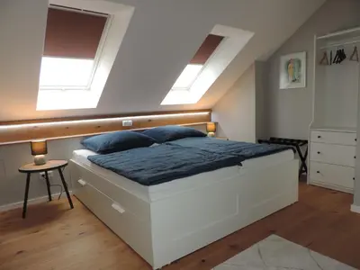 Ein Bett oder Betten in einem Zimmer der Unterkunft Ferienwohnung-Geltendorf Nähe Ammersee