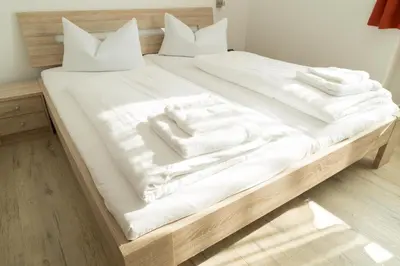 Ein Bett oder Betten in einem Zimmer der Unterkunft Hotel Krone & Restaurant