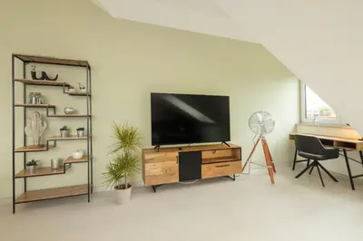TV/Unterhaltungsangebot in der Unterkunft SweetHome - Poing Apartments