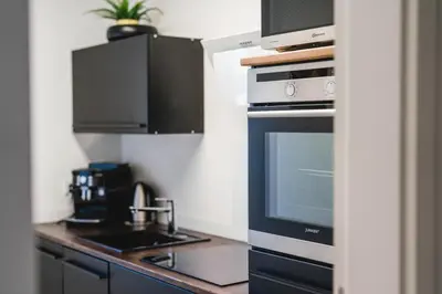 Küche/Küchenzeile in der Unterkunft YAYstay - comfy Lofts in Rosenheim