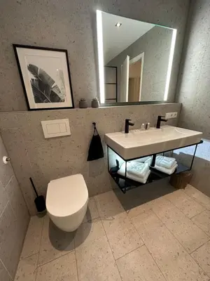 Ein Badezimmer in der Unterkunft 1C Boutique Apartments NR14