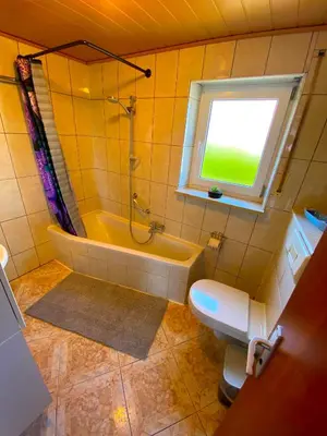 Ein Badezimmer in der Unterkunft Ferienhaus Langweid