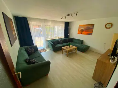 Ein Sitzbereich in der Unterkunft Ferienhaus Langweid