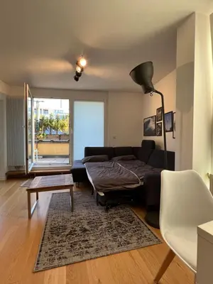 Ein Bett oder Betten in einem Zimmer der Unterkunft Moderne CityWohnung nahe Theresienwiese & Westpark