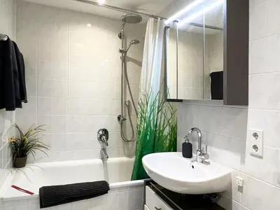 Ein Badezimmer in der Unterkunft Moderne CityWohnung nahe Theresienwiese & Westpark