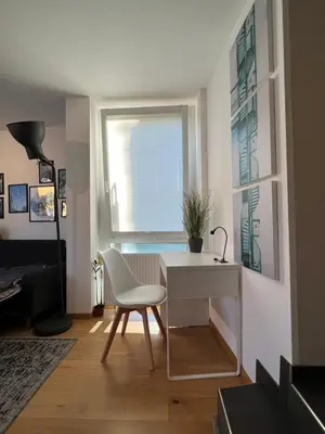 Ein Sitzbereich in der Unterkunft Moderne CityWohnung nahe Theresienwiese & Westpark