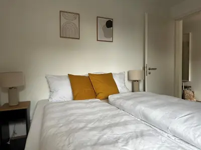 Ein Bett oder Betten in einem Zimmer der Unterkunft Seeapartment