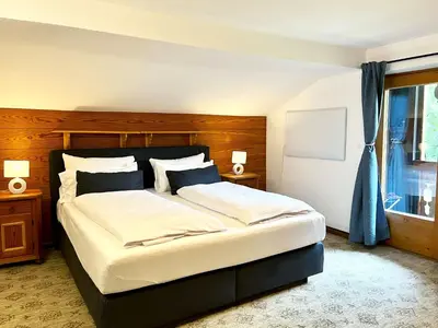 Ein Bett oder Betten in einem Zimmer der Unterkunft Ferienhaus Anni