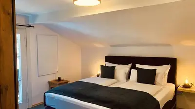 Ein Bett oder Betten in einem Zimmer der Unterkunft Ferienhaus Anni