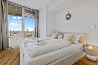Ein Bett oder Betten in einem Zimmer der Unterkunft ma suite -NEW-23Floor-FantasticView-Center