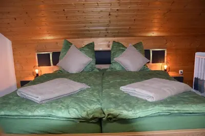 Ein Bett oder Betten in einem Zimmer der Unterkunft Am Bergangerl