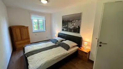 Ein Bett oder Betten in einem Zimmer der Unterkunft Ferienwohnung in Oberschondorf mit Terasse