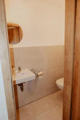 Ein Badezimmer in der Unterkunft Ferienwohnung/Arbeiterwohnung Kampenwand