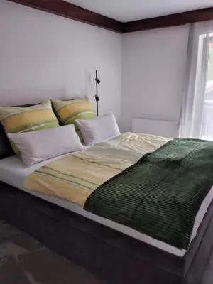 Ein Bett oder Betten in einem Zimmer der Unterkunft Ferienwohnung Familie Cischeck