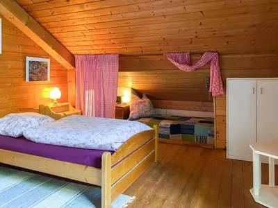 Ein Bett oder Betten in einem Zimmer der Unterkunft Ammergauer Ferienidyll