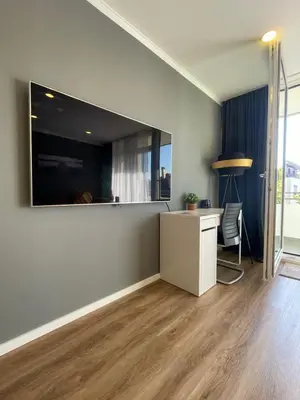 TV/Unterhaltungsangebot in der Unterkunft Wohnung in Augsburg Innenstadt -Tiefgarage
