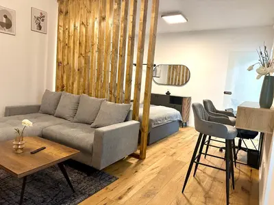 Ein Sitzbereich in der Unterkunft Moderne Erdgeschosswohnung