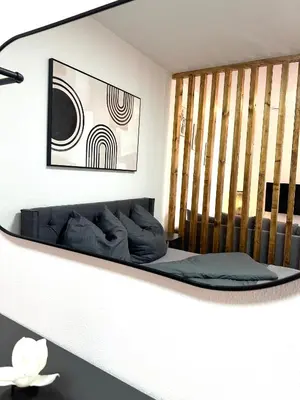 Ein Sitzbereich in der Unterkunft Moderne Erdgeschosswohnung