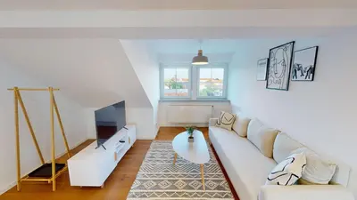 TV/Unterhaltungsangebot in der Unterkunft YUVA HOMES am Kurpark - BRIGHT Collection