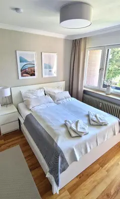 Ein Bett oder Betten in einem Zimmer der Unterkunft Ferienwohnung Edelweiss in Bernau am Chiemsee