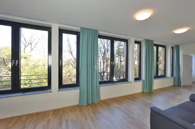 Ein Sitzbereich in der Unterkunft Business Suiten