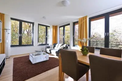 Ein Sitzbereich in der Unterkunft Business Suiten