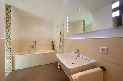 Ein Badezimmer in der Unterkunft Business Suiten