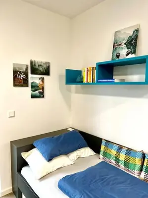 Ein Bett oder Betten in einem Zimmer der Unterkunft Carefree Mikroapartment inkl. Balkon + Tiefgarage