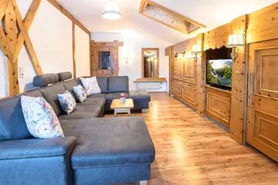Ein Sitzbereich in der Unterkunft Gästehaus Oberland