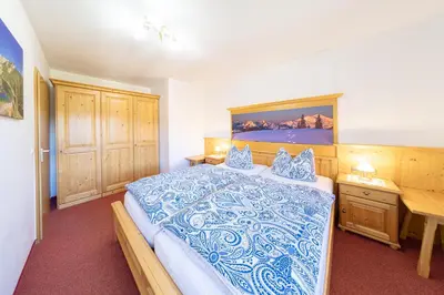 Ein Bett oder Betten in einem Zimmer der Unterkunft Gästehaus Oberland