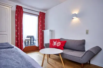 Ein Sitzbereich in der Unterkunft Alpen Gästehaus