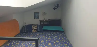 Ein Bett oder Betten in einem Zimmer der Unterkunft Cozy central APARTMENT Leopoldstrasse -3,5 rooms with sauna and garden